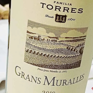 Bottle of Gran Muralles wine from Familia Torres, shown upright with label visible.