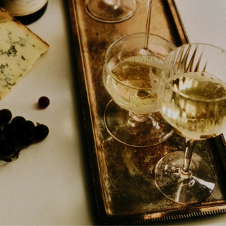 Glamorous top-view shot of sparkling wine glasses on a tray.
