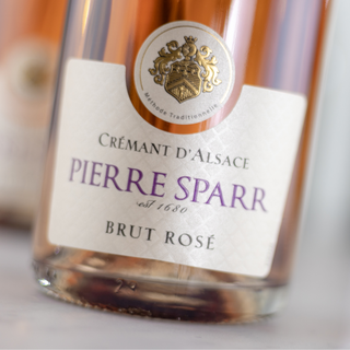 Cropped view of the label on a bottle of Pierre Sparr Crémant d’Alsace Brut Rosé.