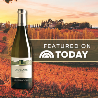 Bottle of Arnaldo Caprai Grecante Grechetto Colli Martani DOC 2024 displayed on the left-hand side against an autumn-colored vineyard landscape, alongside a banner featuring the Today show logo and the text “Featured on Today.”
