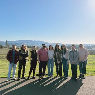 A group photo of Galaxy Washington employees outside.