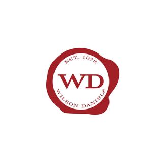 A photo of Wilson Daniels' logo, which is a 2-D, burgundy wax seal.